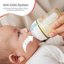 Silicone nipple for infants, showing anti-colic features with arrows indicating milk flow and air venting.