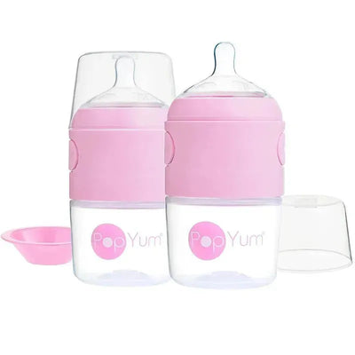 Two 5 oz Popyum baby bottles in pastel purple with anti-colic design, accompanied by a pink cap and a separate lid.