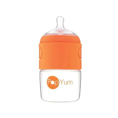 Anti-colic baby bottle by PopYum, 5 oz, featuring a clear body and orange silicone grip.