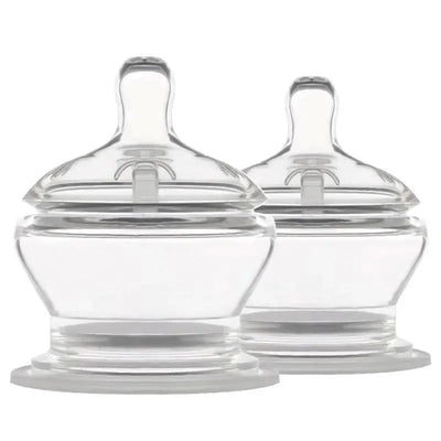 Two clear, slow-flow nipples designed for Stage 1 feeding, suitable for infant bottles, featuring rounded tops and a stable base.