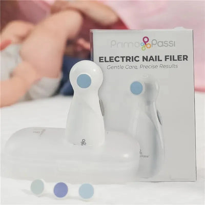 Baby electric nail filer by Primo Passi, featuring a white ergonomic design with a blue button and a storage case.