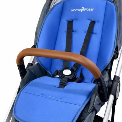 Primo Passi universal stroller liner in blue, featuring padded seating and safety straps, designed for stroller and car seat protection.