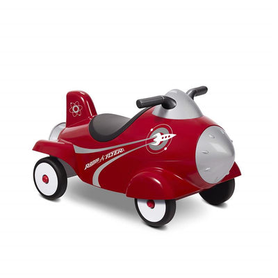 Retro Rocket Ride-On toy car in red, featuring a sleek design with a silver nose, black seat, and white wheels.