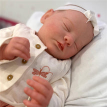 Reborn Baby Dolls - Vinyl + Cloth White Baby Evelyn (Light Brown Painted Hair | Closed Eyes) Image 1