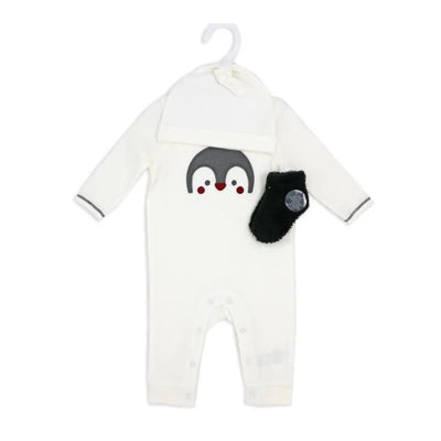 Neutral ivory coverall set featuring a penguin face design, accompanied by a matching hat and fuzzy sock.