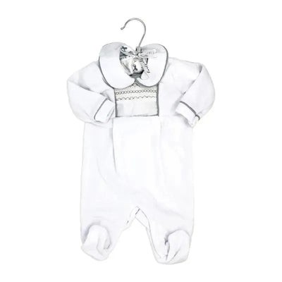 Neutral velour coverall in white with a smocked chest and large collar, designed for infants, displayed on a hanger.