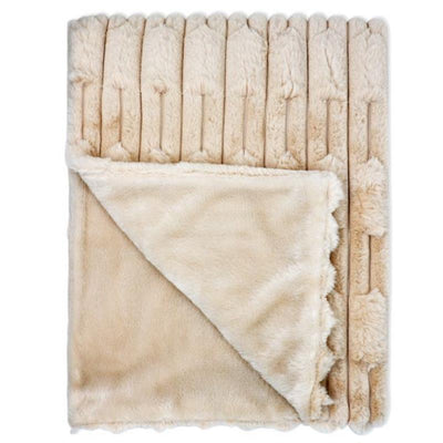 Tan baby fleece blanket from Rose Textiles, featuring a soft, plush texture with a scalloped edge.