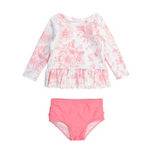 Long sleeve swimsuit set featuring a pink floral top with ruffle hem and matching pink bikini bottom.