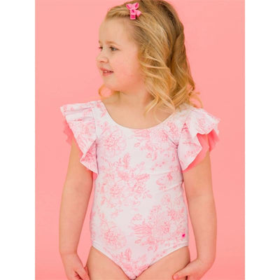Bubblegum pink one-piece swimsuit with floral pattern and butterfly sleeves, worn by a smiling young girl.