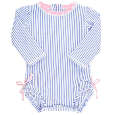 Rufflebutts periwinkle blue seersucker long sleeve one-piece rash guard for newborns, featuring pink trim and ties.