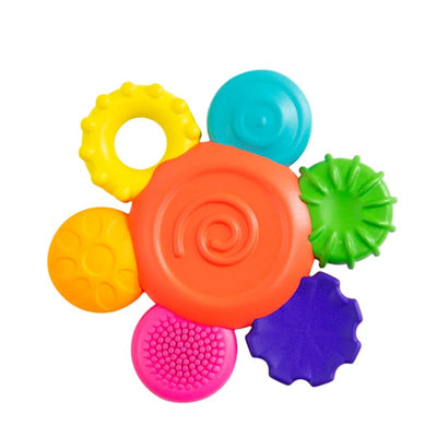 Colorful silicone flower-shaped teether rattle featuring multiple textured petals in orange, yellow, green, blue, purple, and pink.