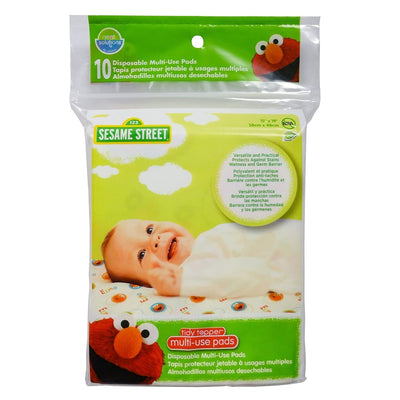 Sesame Street Tidy Topper Multi-Use Pads, 10 count, features a smiling baby on a pad with Elmo design, highlighting its versatility and stain protection.