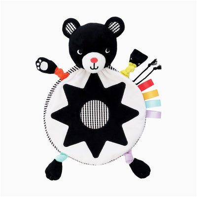Sassy Wimmer Bear Lovey, a plush black bear toy with colorful tags and a sun-shaped blanket for comfort and play.