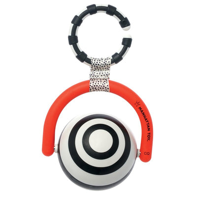 Sassy Wimmer Bullseye Ball featuring a black and white spiral design, attached to a red and black handle for easy gripping.
