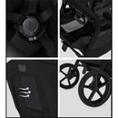 Details of the Silver Cross Breez Compact Stroller, highlighting secure harness, storage space, ventilation panel, and wheels.