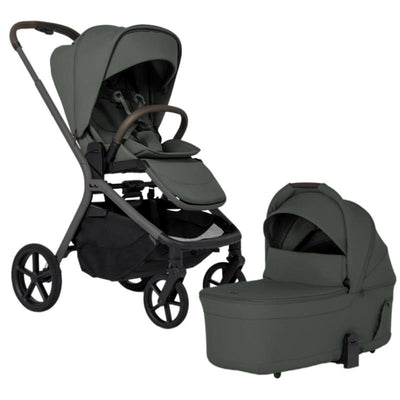 Silver Cross Breez Compact Stroller in pewter with a matching folding bassinet, featuring a modern design and grey fabric.