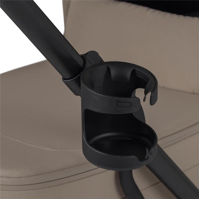 Cup holder accessory for the Silver Cross Nia stroller, designed to securely hold beverages.