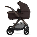 Silver Cross Reef 2 folding bassinet in Ganache color, featuring a sleek frame, adjustable canopy, and spacious sleeping area.