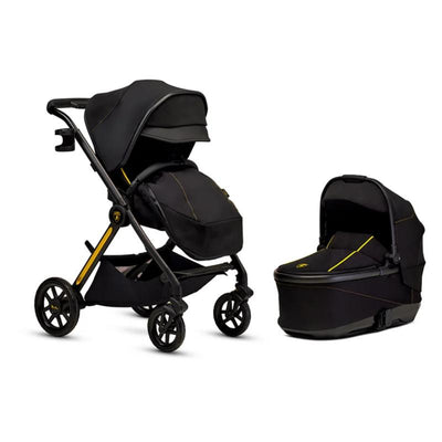 Silver Cross Reef AL Giallo stroller and bassinet bundle in black with yellow accents, showcasing sleek design and functionality.