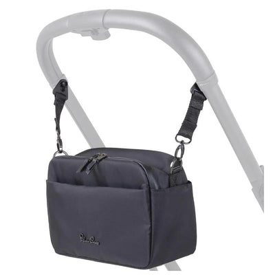 Black Silver Cross Universal Parent Stroller Organizer attached to a stroller handle, featuring a zippered top and an exterior pocket.