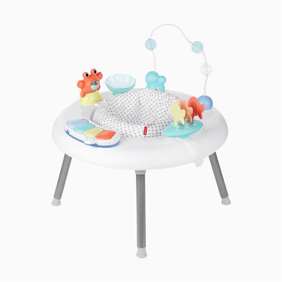 Skip Hop 2-in-1 Baby Activity Center features a soft seat, colorful toys, and an interactive music panel for developmental play.