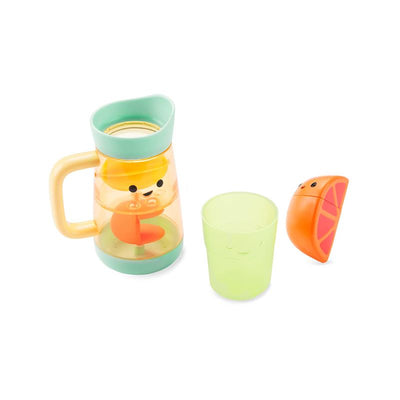 Colorful baby bath toy set featuring a lemonade pitcher with smiling face, a green cup, and an orange slice container.