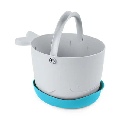 Gray whale-shaped bath toy bucket with a blue base, featuring a handle for easy carrying.