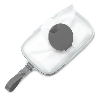 Gray Skip Hop Grab & Go Snug Seal Wipes Case with a circular gray closure and wipes partially visible inside.