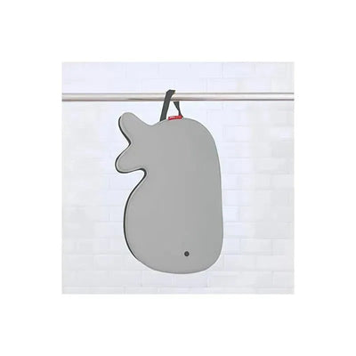 Grey Skip Hop Moby Bath Kneeler with a whale shape, featuring a hanging strap, designed for comfort during bath time.