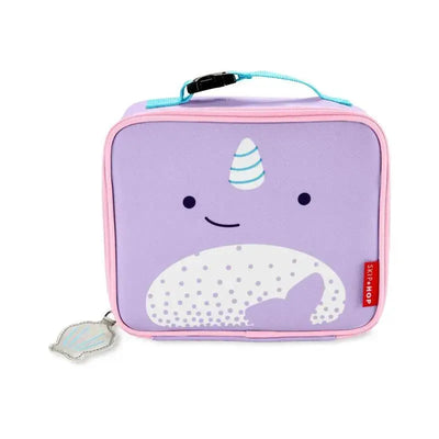 Purple lunch bag with a smiling narwhal design, featuring a blue handle and a shell-shaped zipper pull.
