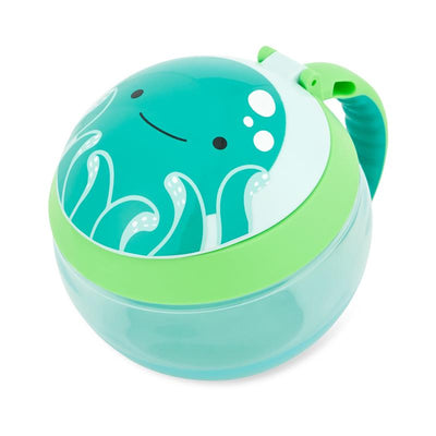 Skip Hop Zoo Snack Cup in the shape of a cheerful teal octopus, featuring a green handle and a secure lid designed for snacks.