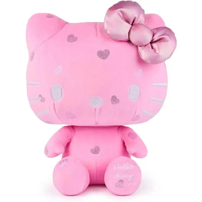 Plush Hello Kitty toy in pink with a satin bow and heart patterns, celebrating Spin Master’s 50th anniversary.