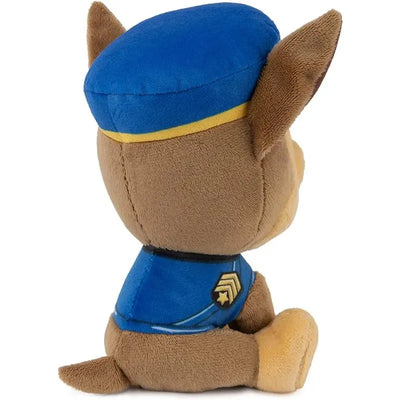 Plush toy of a dog character in a blue police officer uniform, featuring a cap and badge details.