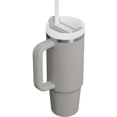 Stanley The Quencher H2.0 FlowState™ Tumbler 30 oz in Ash color, featuring a handle, straw, and wide lid for easy sipping.
