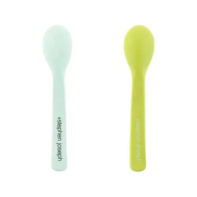 Green silicone baby spoons by Stephen Joseph, featuring a soft design, suitable for feeding infants.