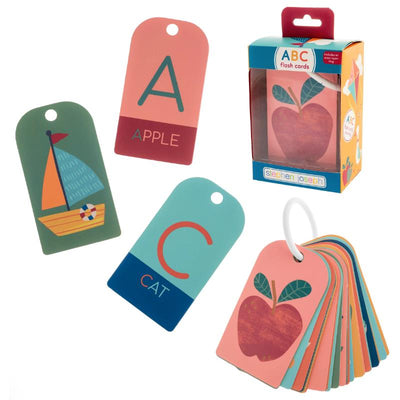 Colorful ABC flashcards featuring letters and illustrations like a sailboat and apple, packaged in a box by Stephen Joseph.