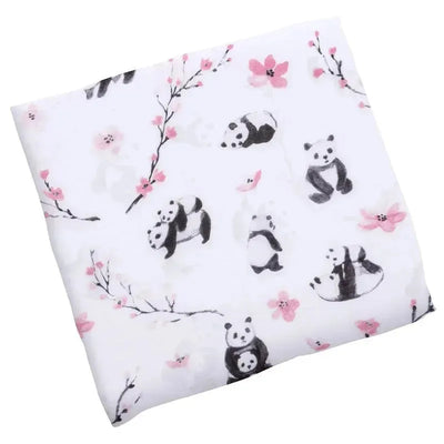 Muslin blanket featuring panda illustrations amid pink flowers on a white background. Ideal for baby use.