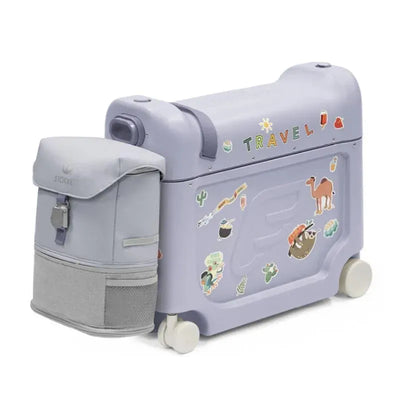 Travel bundle includes a purple wheeled suitcase with travel-themed stickers and a gray backpack.