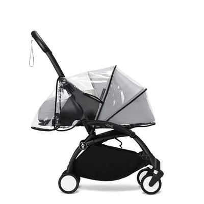 Stokke Yoyo 0+ Newborn Pack Rain Cover in black, designed to fit over a stroller, providing weather protection.