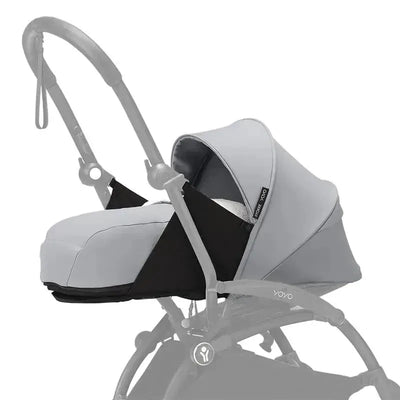 Stokke Yoyo 0+ Newborn Pack in Stone, featuring a soft gray fabric, compatible with Yoyo stroller frame.