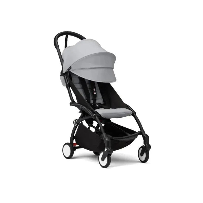 Stokke Yoyo³ stroller 6+, featuring a black frame and stone fabric, with adjustable canopy and leg rest.