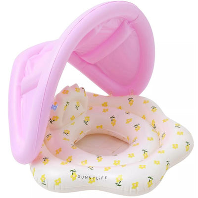 Baby float featuring a pink canopy and a floral design in yellow and green, designed for children.