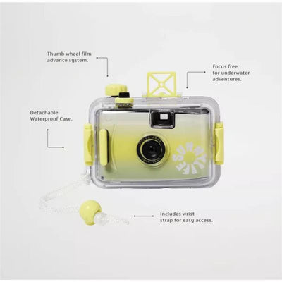 Underwater camera in citrus ombre design, featuring a waterproof case, thumb wheel film advance, and a wrist strap for easy access.