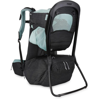 Thule Sapling Child Carrier Backpack in black and teal, featuring a sturdy frame, mesh panels, and adjustable straps.