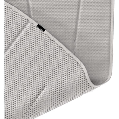 Gray Thule Summer Seat Liner with textured surface and edges, designed for enhancing comfort in child car seats.