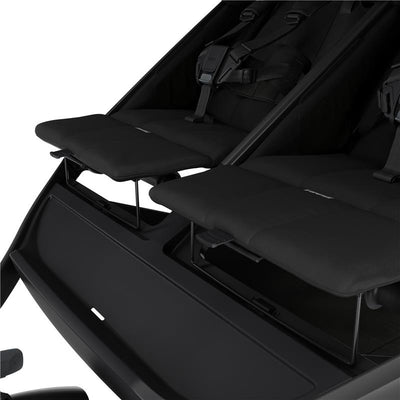 Thule Urban Glide Stroller 3 in double black, featuring padded seats and magnetic buckles, with a sleek design.