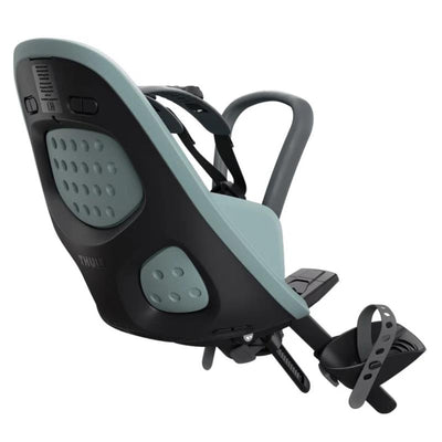 Thule Yepp 2 Mini Front Mount Bike Seat in mid blue, featuring safety straps, a durable design, and footrests.