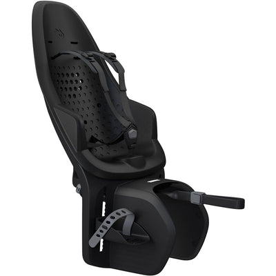 Thule Yepp 2 mounted child bike seat in black, featuring adjustable footrests and a 5-point harness system.