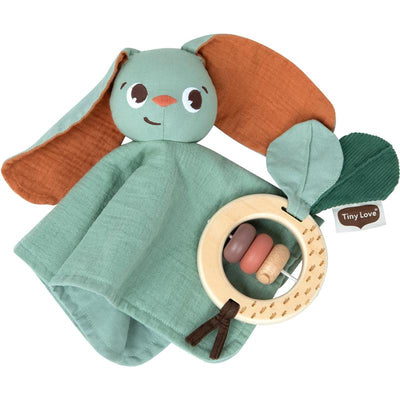 Soft mint and rust toy featuring a rabbit with long ears, along with a wooden teething ring and colorful beads.