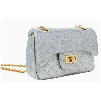 Mini quilted silver bag featuring a sparkling finish and gold clasp, ideal for stylish outings.